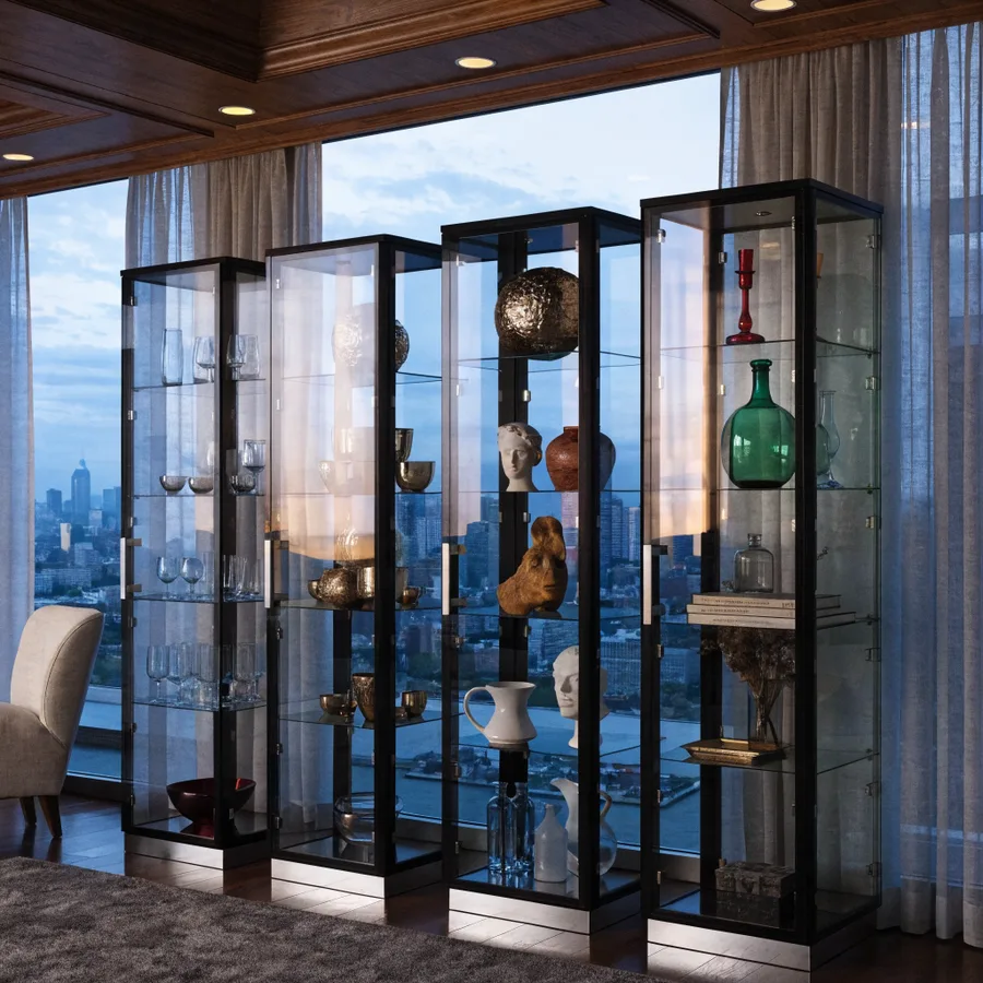 Three Detolf cabinets placed side by side creating a display wall