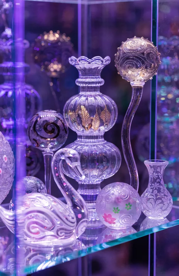 Detolf cabinet displaying anime figurines with warm LED backlighting